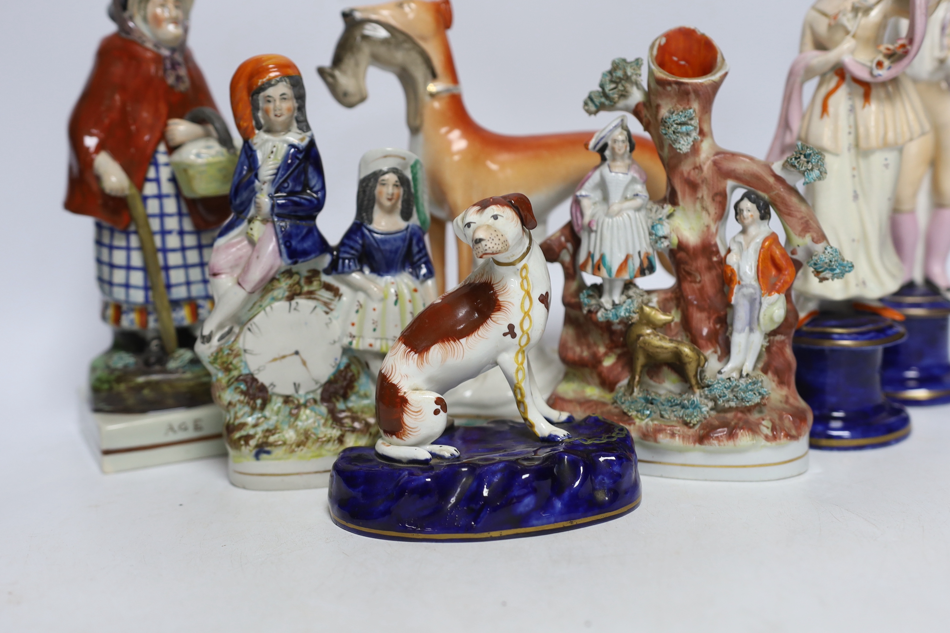 Seven mid 19th century Staffordshire pottery figures, tallest 22cm